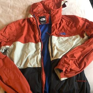 North face jacket. Orange blue and cream colorway